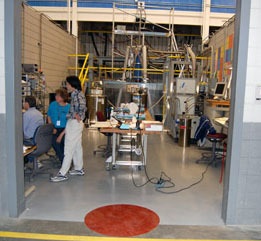 Scientists gather data from the world-record 36.2 tesla magnet, located at the rear of this "cell."