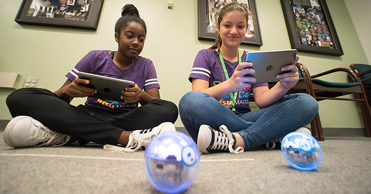 SciGirls Coding campers program robots during the 2019 camp.