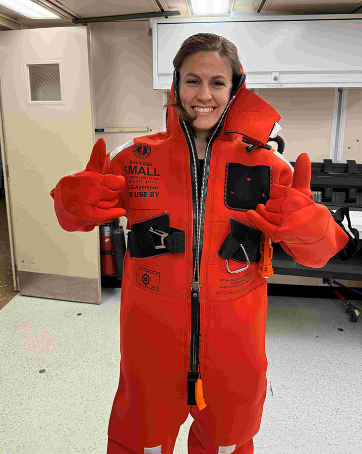 Lydia in her survival suit on board the RV Roger Revelle.