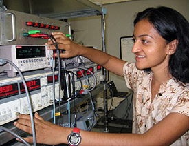 A visiting scientist, or user, checks her data in the lab's Millikelvin Facility.