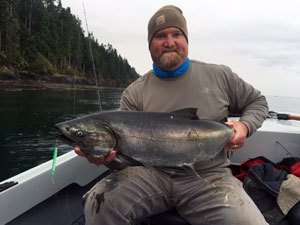 Ryan Rodgers (fishing for king salmon in Washington state) has a deep connection to the environment he studies.