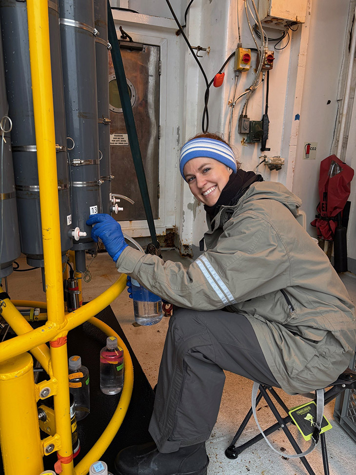 Lydia Babcock-Adams working on seawater samples from the CTD rosette