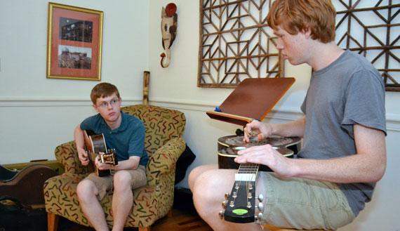 Jasper Brey (on guitar) and brother Max (on dobro) have done well in the sciences, but remain passionate musicians.