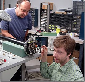 Richard Desilets and Peter Gor'kov work on a probe.