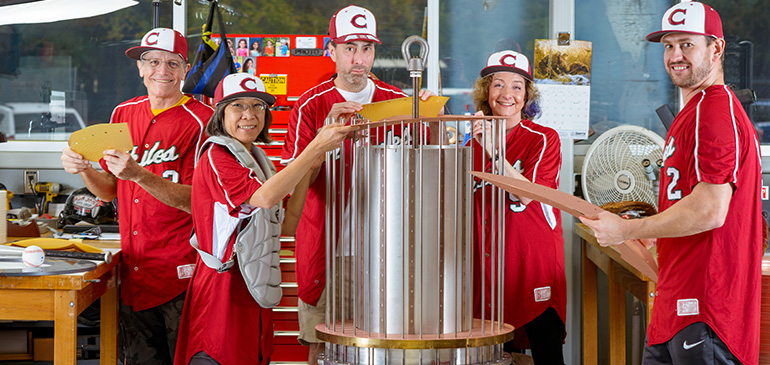 Representing the Magnet Science & Technology team, building a magnet coil, are (from left to right): technician Jim O'Reilly, webmaster M Tabtimtong, technician Randy Helms, chief scientist Laura Greene and technician Brent Jarvis