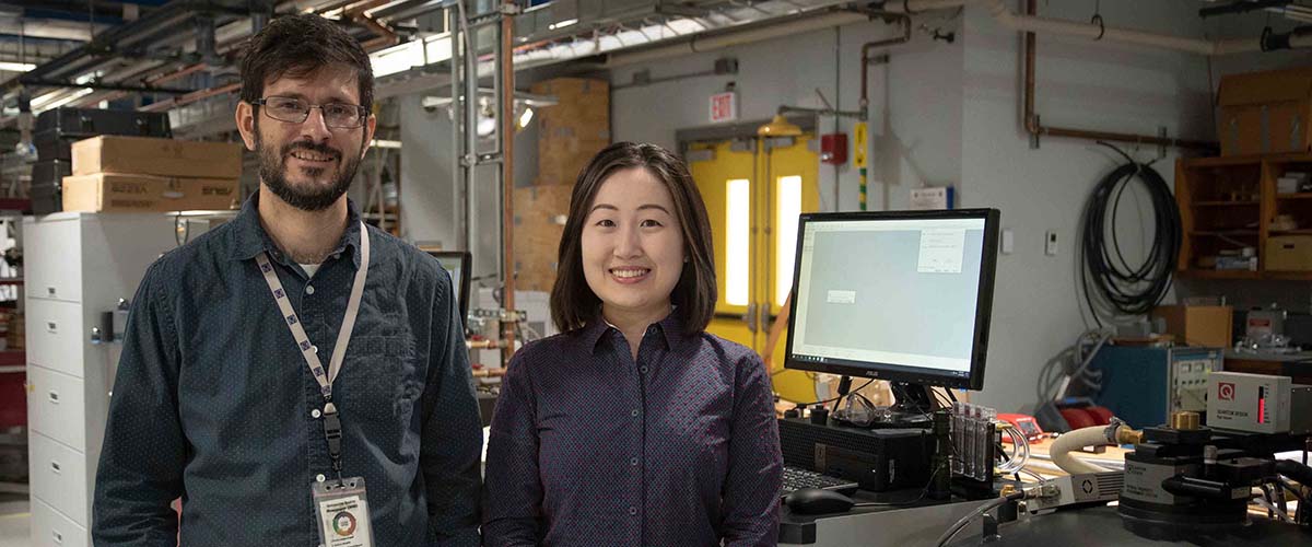 MagLab physicists Ryan Baumbach (left) and Kaya Wei study a class of materials with promising thermoelectric properties