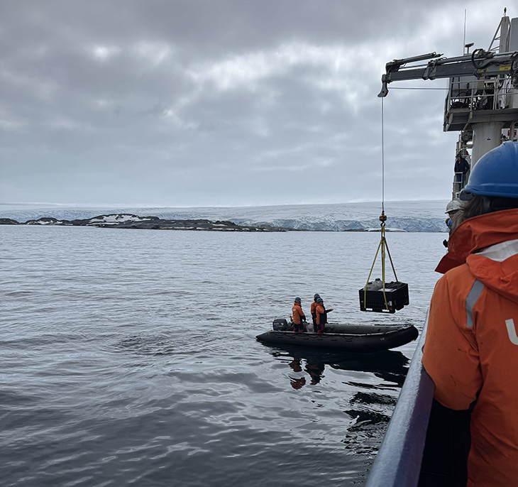 Using a small boat to bring supplies ashore.