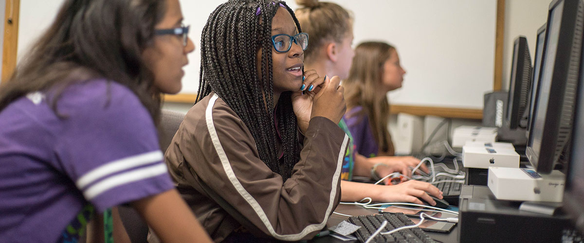 Participants in the 2019 SciGirls Coding Camp at the MagLab practice their skills.