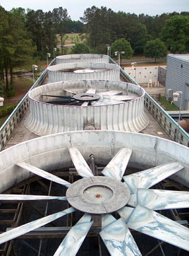 Energy that entered the lab as electricity exits as thermal energy through four cooling towers, evaporating into the atmosphere.