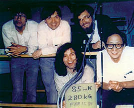 Boebinger (with beard) in 1984, at the end of his first magnet run of his career. The group at MIT set a new record for peak magnetic field and low temperature. Front row: Horst Stormer (holding sign) and Dan Tsui. Back row, left to right: Al Chang (then Tsui's postdoc, now a physics professor at Duke University), visiting scientist Peter Berglund and Boebinger.