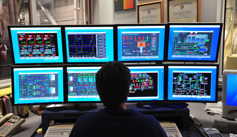 An operator in the DC Field Facility's control room keeps an eye on experiments.