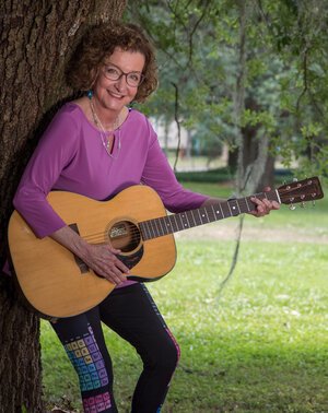 Laura Greene with her Guitar