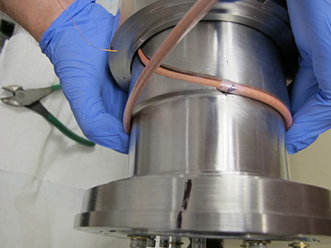 Completing the most difficult part of the magnet winding, when the CORC cable is guided into the first magnet layer.