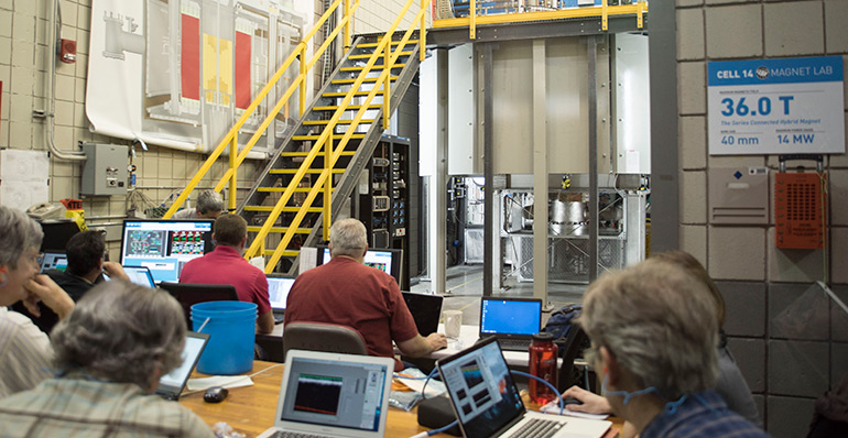 Magnet operators and engineers during the first system tests