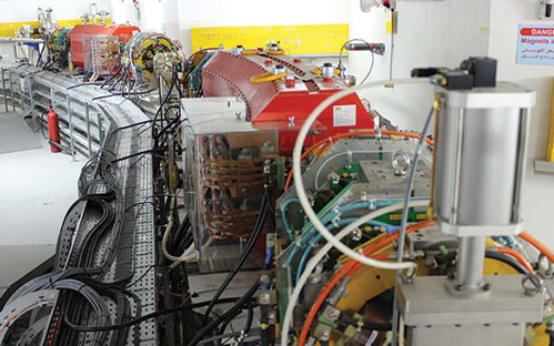 The synchrotron's main ring during installation.