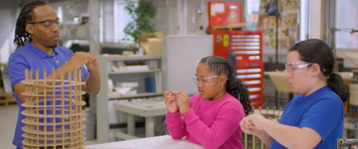 MagLab physicist Shermane Benjamin (left) works with hosts McKenzie and Daniel to build a simple electromagnet in the Meet the Magnets Virtual Field Trip to the National MagLab by Discovery Education and Sesame Workshop.