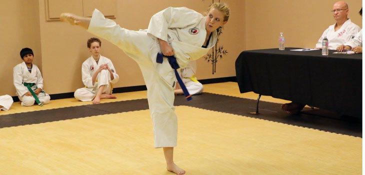 Karate builds confidence that translates into her research, said Kari Roberts.