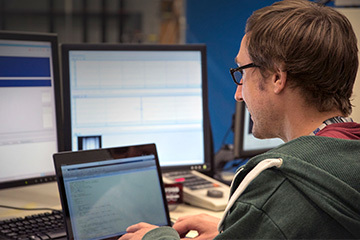 NMR User looking at data on the 900Mhz MRI magnet