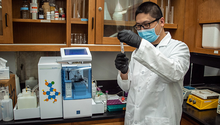 MagLab postdoctoral fellow and engineer Xuegang Yuan assesses metabolism in cultured human mesenchymal stem cells at the FAMU-FSU College of Engineering.
