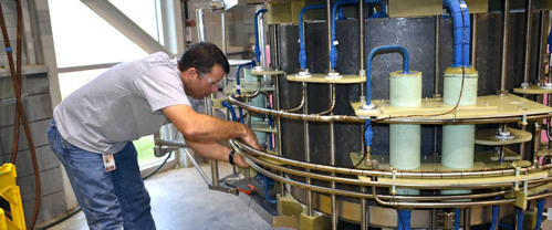 MagLab engineer Lee Marks prepares the 7.2 ton “cold-mass” of the series connected hybrid magnet for its journey from Tallahassee to Berlin.